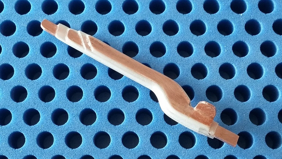 Resin + microballoons added on the edges for further insulation and shaping