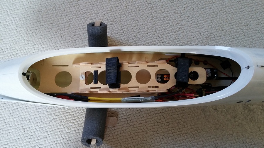 Battery plate slid in place in its holder